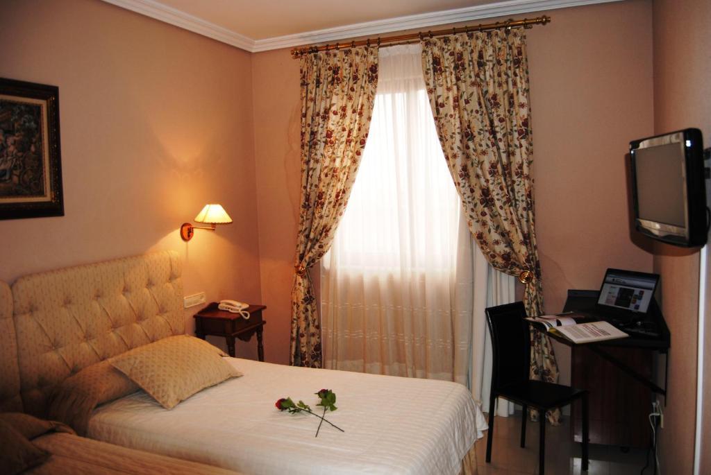 Hotel Cristina-Enea Valdeganga Pokoj fotografie